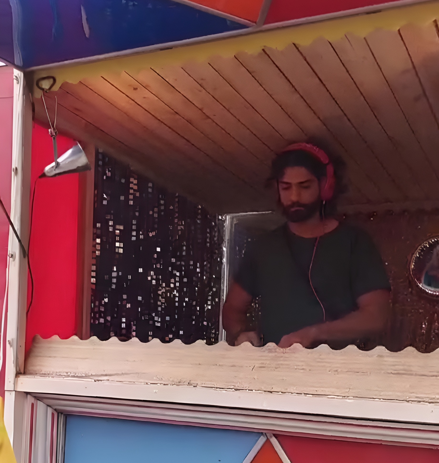 Fawad Javaid performing in a booth